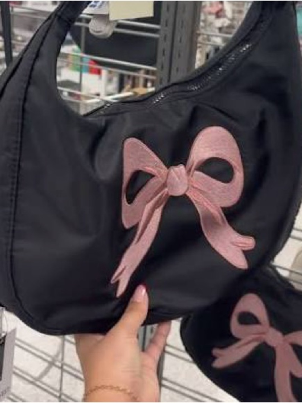 Black Shoulder Bag with Pink Bow Accent